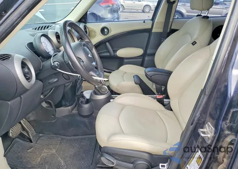 2011 Mini Cooper S Countryman z USA, uszkodzony, nr VIN WMWZC3C54BWL79671